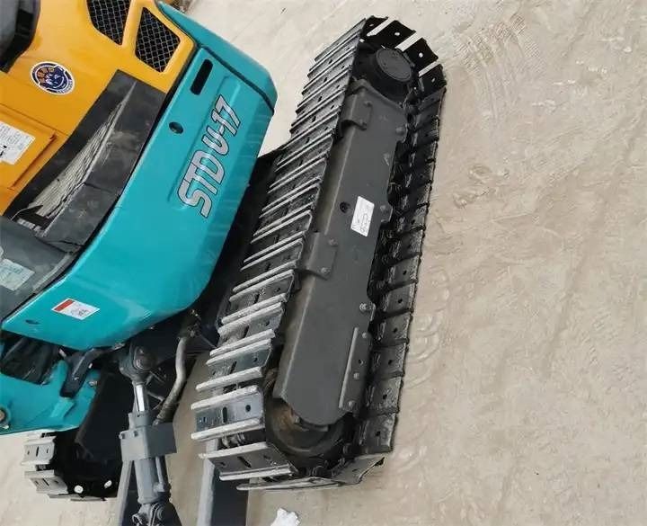 2024 Kubota U-17 mini excavator track and side panel view 2024 Kubota U-17 mini excavator track and side panel view