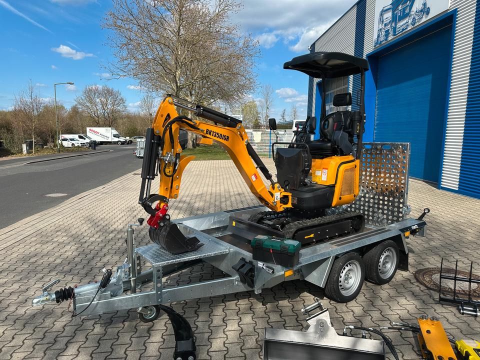 Berger Kraus BK1350JSR mini excavator on trailer, side view Berger Kraus BK1350JSR mini excavator on trailer, side view