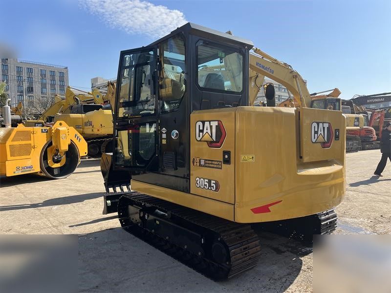 2024 Caterpillar 305.5E2 mini excavator, rear three-quarter view 2024 Caterpillar 305.5E2 mini excavator, rear three-quarter view