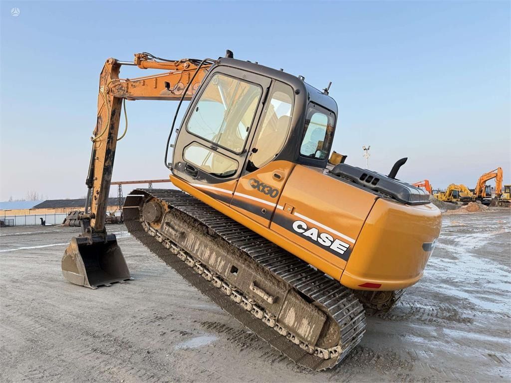 2006 CASE CX130 crawler excavator, rear three-quarter view 2006 CASE CX130 crawler excavator, rear three-quarter view