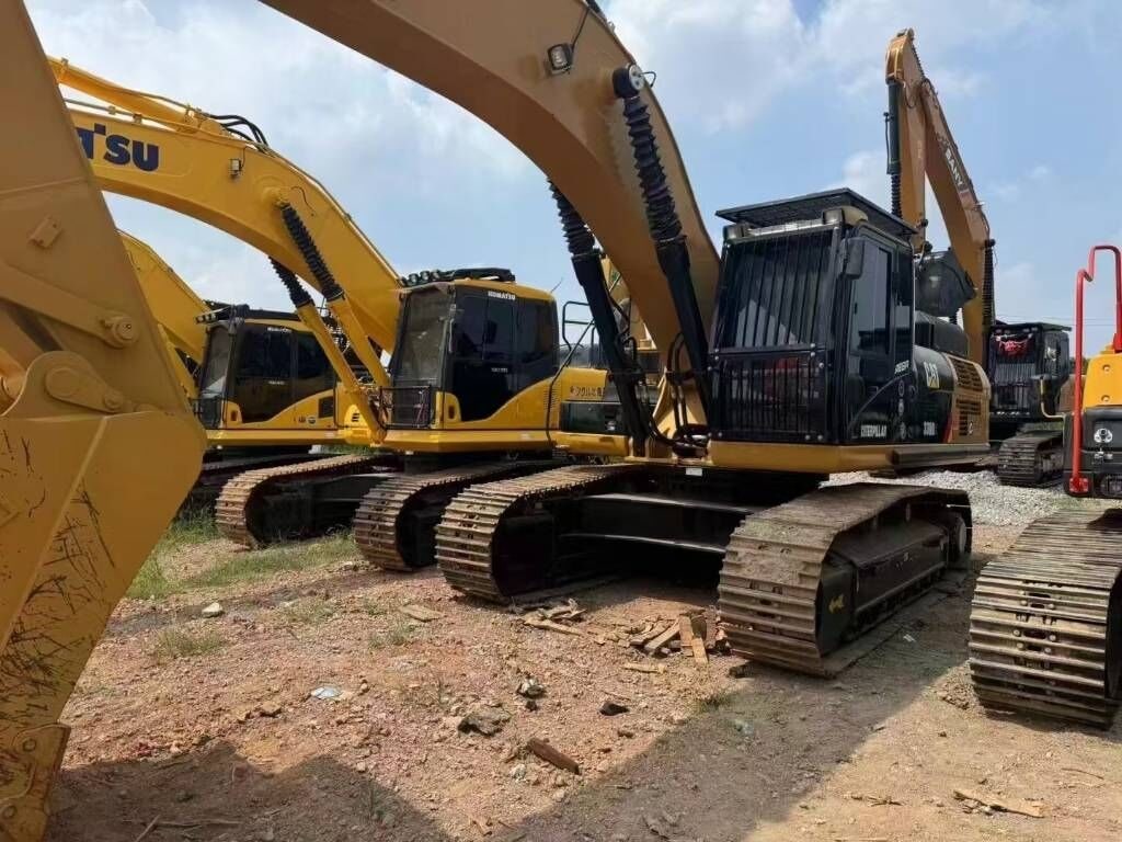 2025 Caterpillar 330 crawler excavator, front three-quarter view