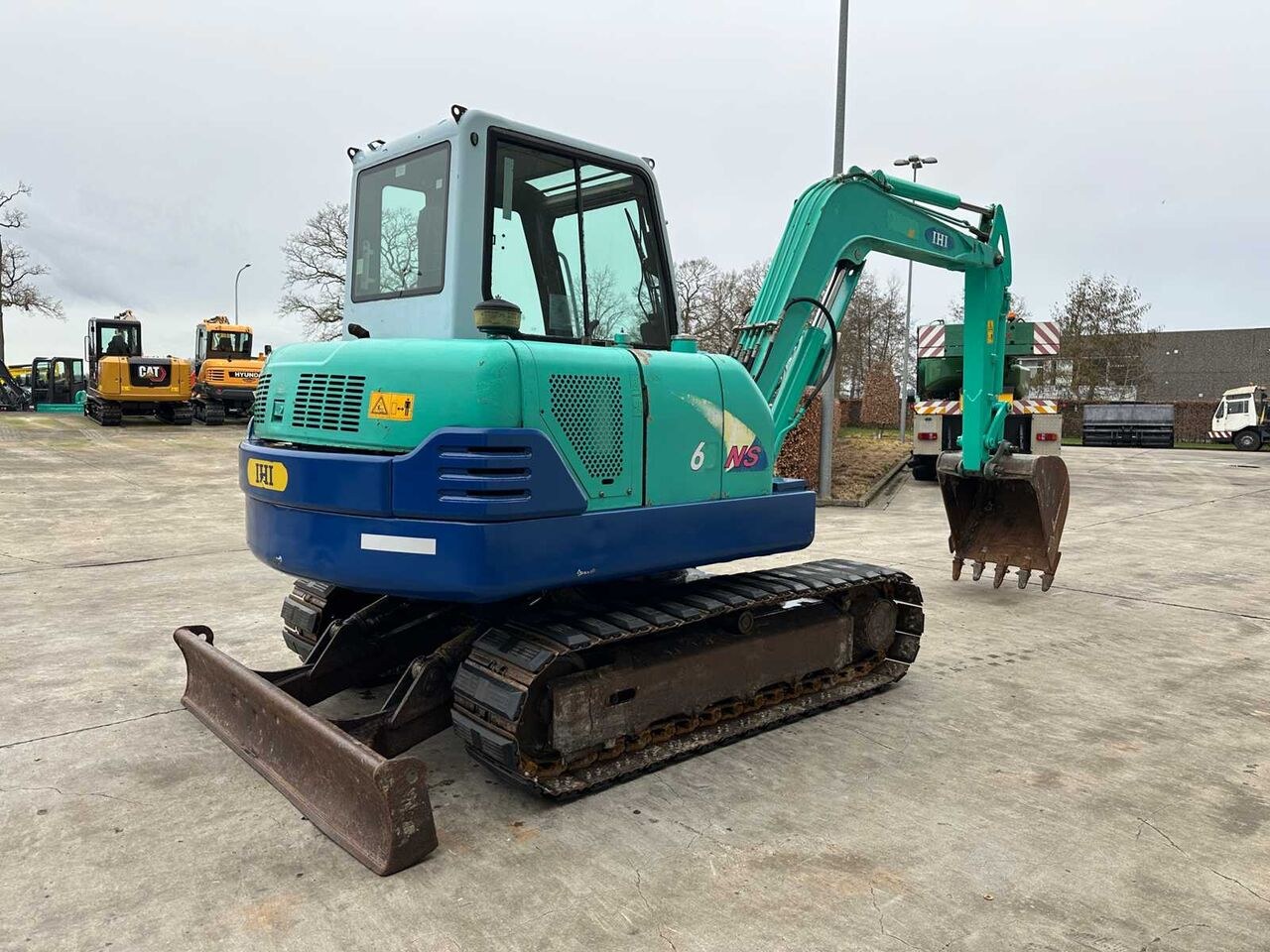 IHI 60NS mini excavator, rear three-quarter view