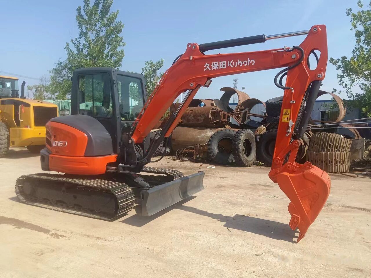 2022 Kubota KX163 mini excavator, side view 2022 Kubota KX163 mini excavator, side view
