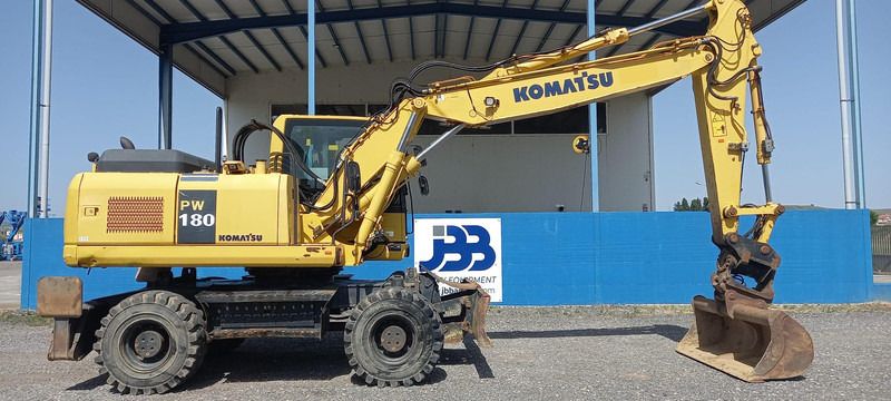 2016 Komatsu PW180-7EO wheel excavator, side profile view 2016 Komatsu PW180-7EO wheel excavator, side profile view