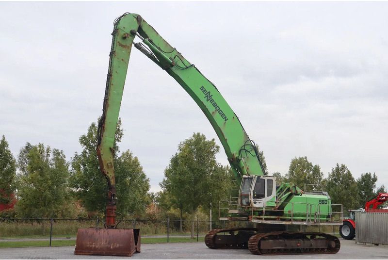 2015 Sennebogen 860R material handler with clamshell bucket, side view