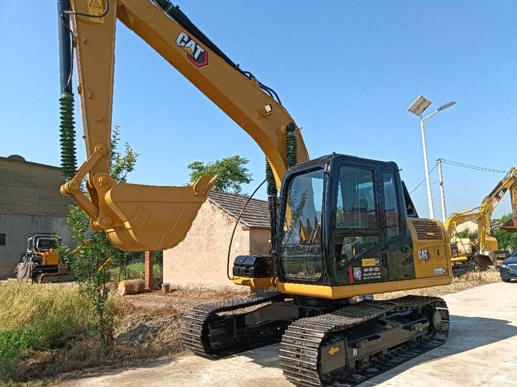 2023 Caterpillar 313 GC crawler excavator, side profile view 2023 Caterpillar 313 GC crawler excavator, side profile view