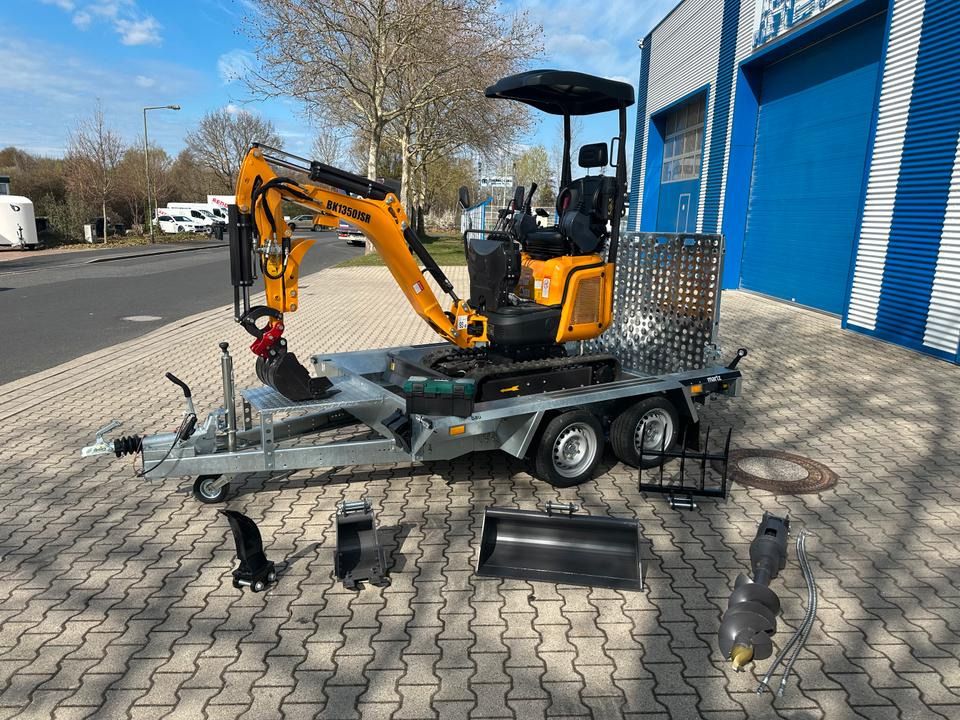 Berger Kraus BK1350JSR mini excavator on trailer with attachments