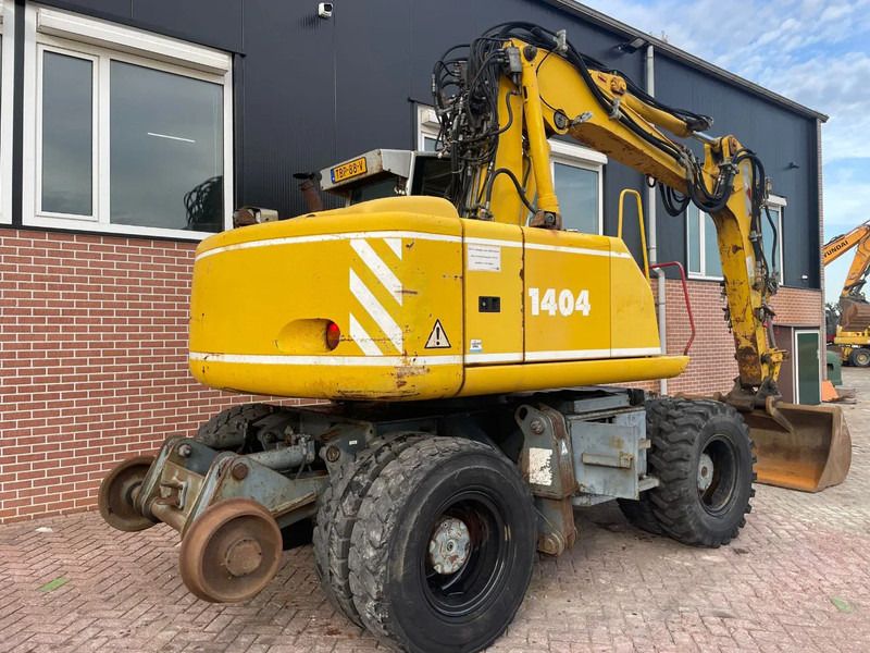 2006 Atlas 1404K wheel excavator, rear three-quarter view