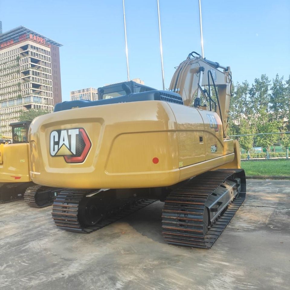2025 Caterpillar 320GX crawler excavator, rear three-quarter view