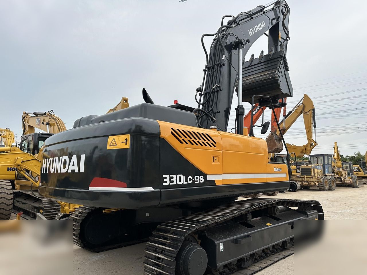 2019 Hyundai 330LC-9S crawler excavator, rear three-quarter view 2019 Hyundai 330LC-9S crawler excavator, rear three-quarter view