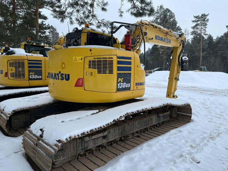 2014 Komatsu PC138US-10 crawler excavator, rear three-quarter view 2014 Komatsu PC138US-10 crawler excavator, rear three-quarter view