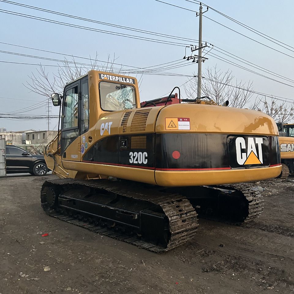 2022 Caterpillar 320C excavator, rear three-quarter view 2022 Caterpillar 320C excavator, rear three-quarter view