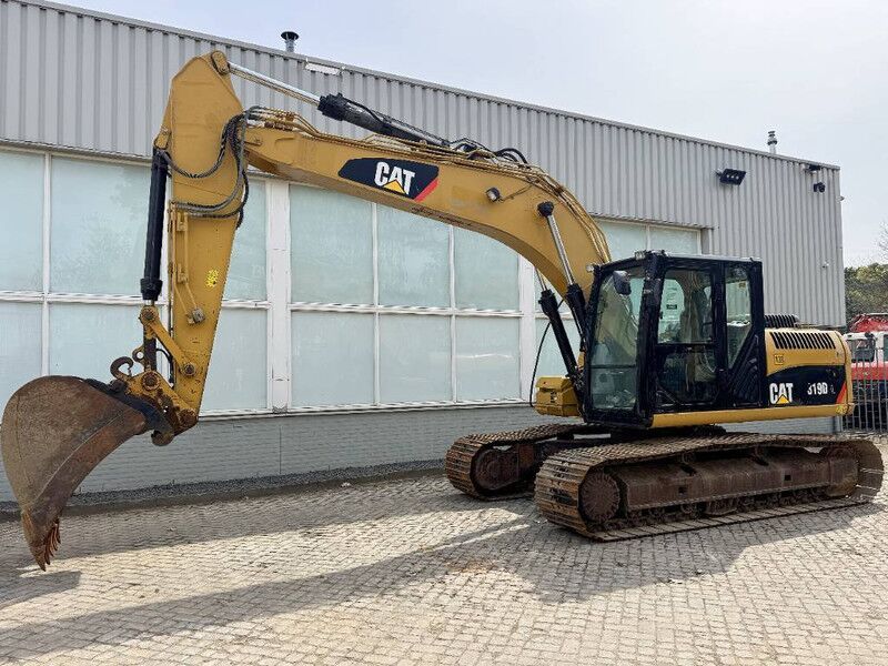 2012 Caterpillar 319D crawler excavator, side view