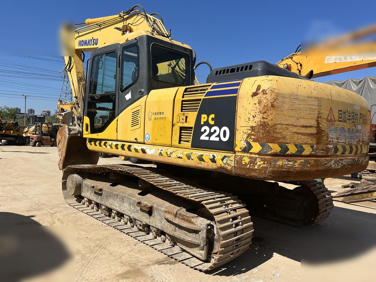 2018 Komatsu PC220-7 crawler excavator, rear three-quarter view 2018 Komatsu PC220-7 crawler excavator, rear three-quarter view