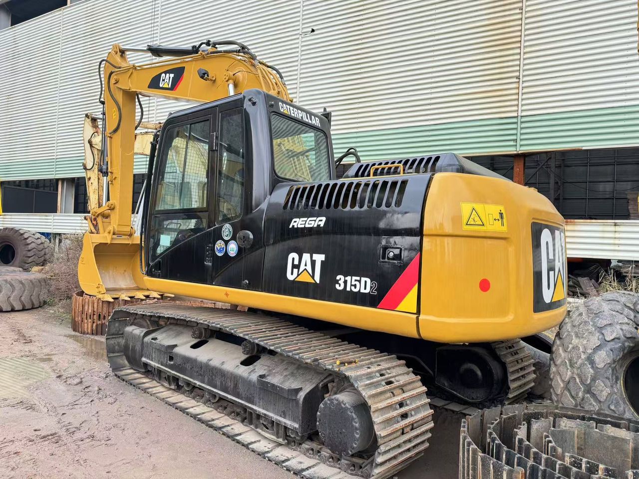 2019 Caterpillar 315D2 crawler excavator, rear three-quarter view