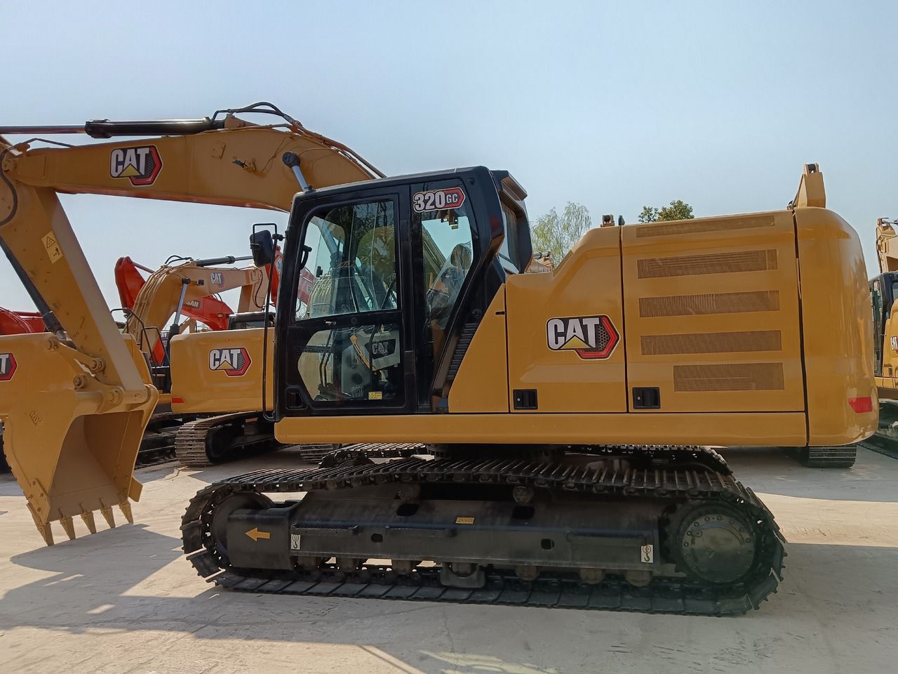 2023 Caterpillar 320GC crawler excavator, side profile view 2023 Caterpillar 320GC crawler excavator, side profile view