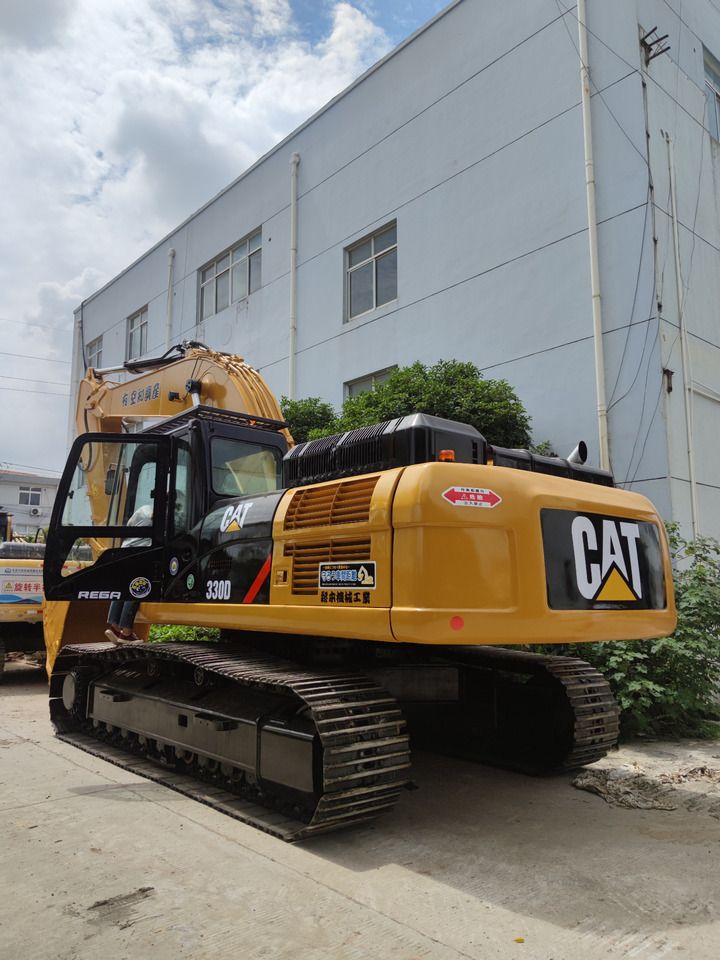 Caterpillar 330D crawler excavator, rear three-quarter view Caterpillar 330D crawler excavator, rear three-quarter view