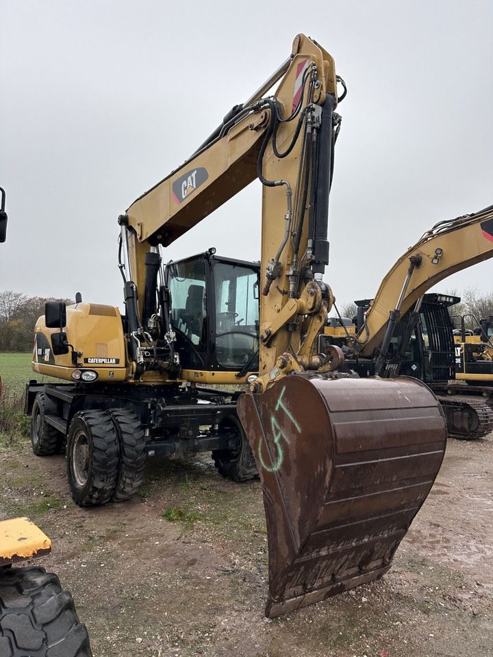 2013 Caterpillar M316D wheel excavator, front three-quarter view 2013 Caterpillar M316D wheel excavator, front three-quarter view