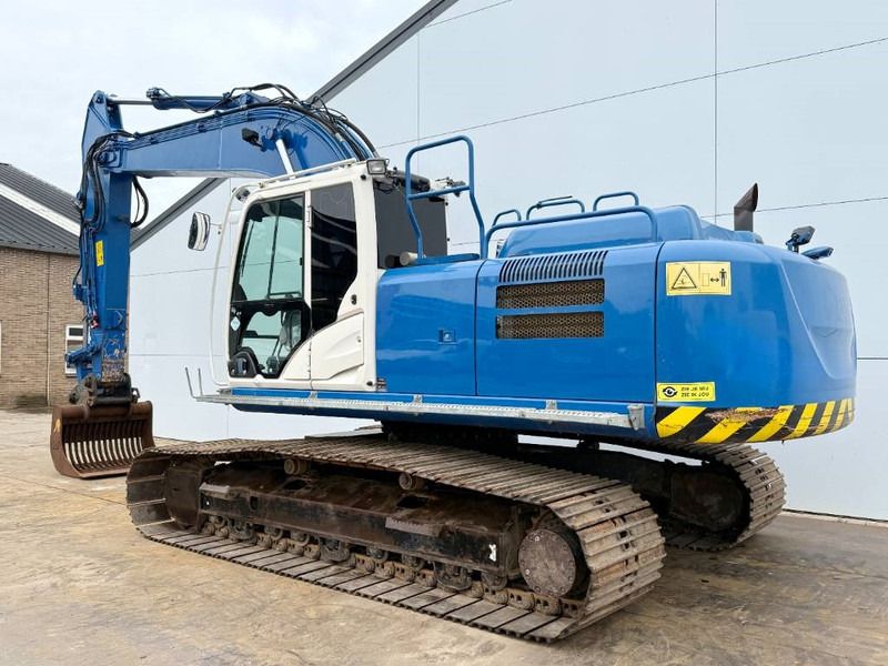 2016 Hitachi ZX250LC-6 crawler excavator, rear three-quarter view 2016 Hitachi ZX250LC-6 crawler excavator, rear three-quarter view