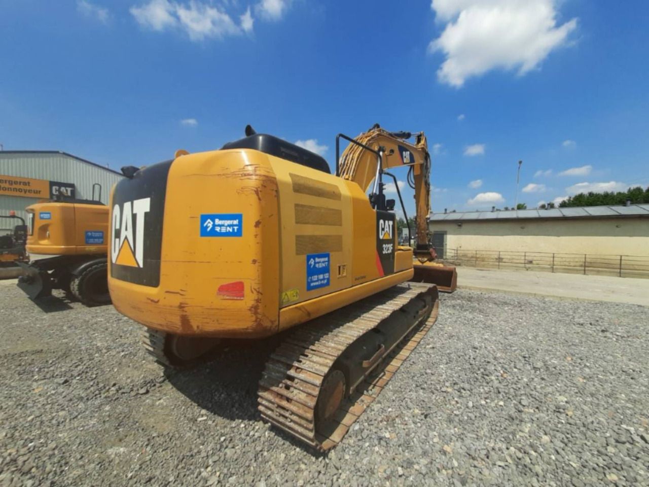 2017 Caterpillar 323FL crawler excavator, rear three-quarter view