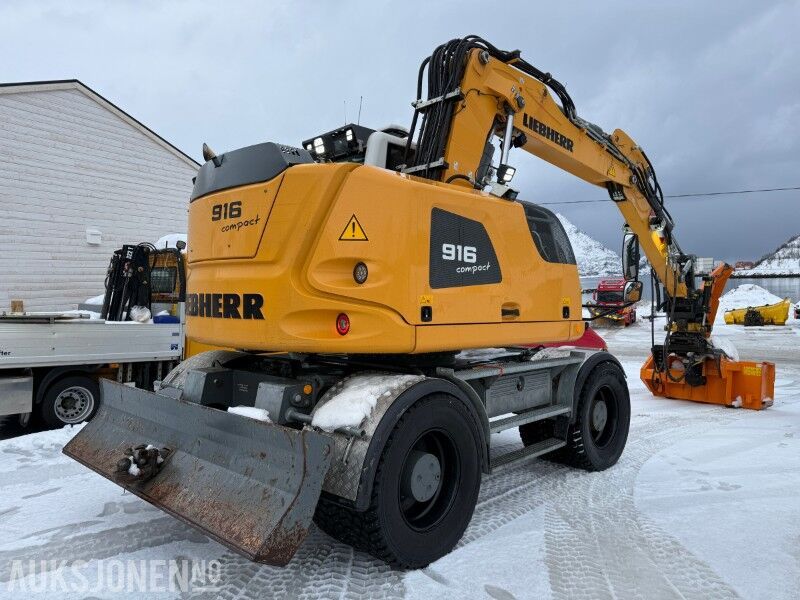 2021 Liebherr 916 Compact wheel excavator, rear three-quarter view 2021 Liebherr 916 Compact wheel excavator, rear three-quarter view