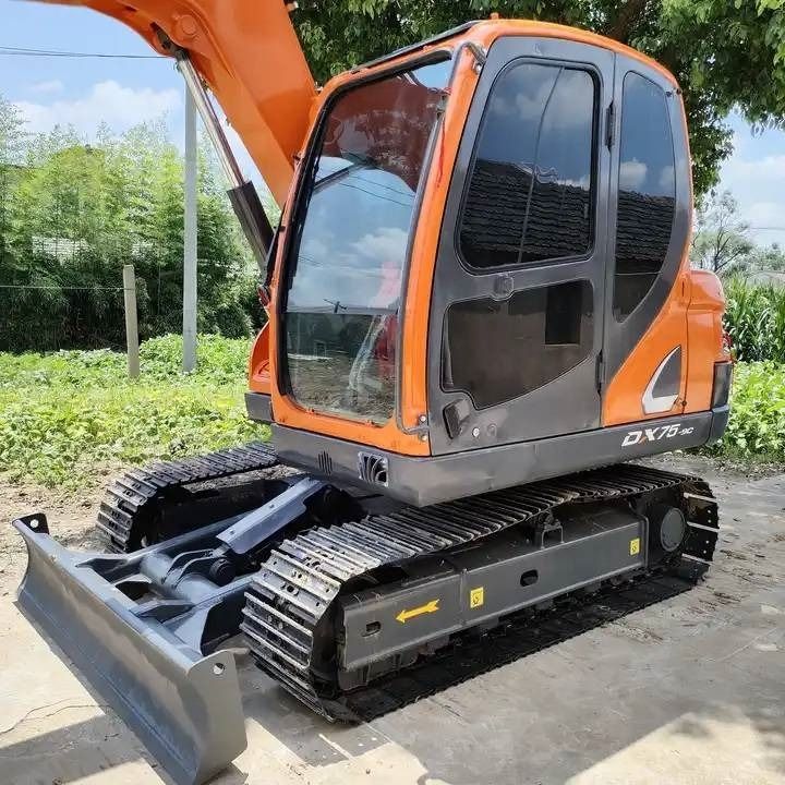 2024 Doosan DX75-9C mini excavator, front three-quarter view