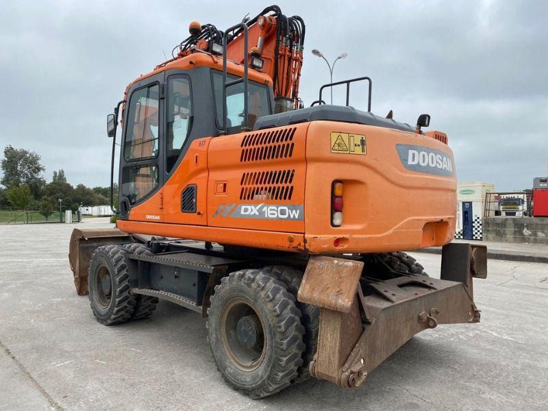 2016 Doosan DX160W wheel excavator rear three-quarter view
