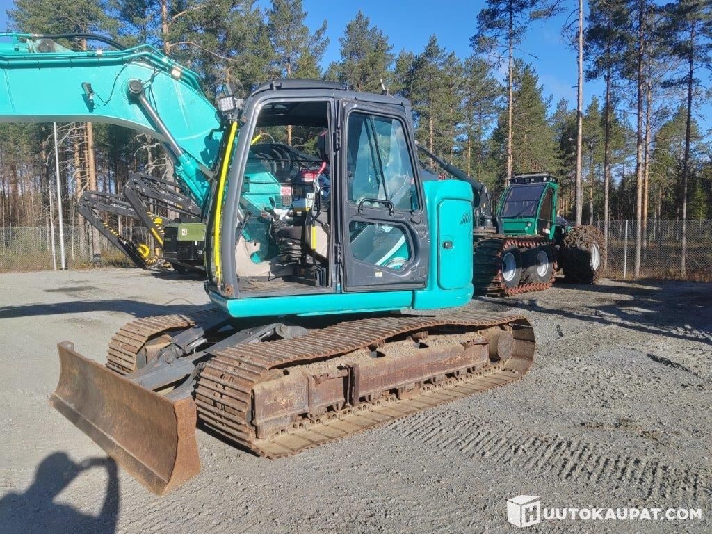 2018 Kobelco SK140SRLC-5 crawler excavator, side view 2018 Kobelco SK140SRLC-5 crawler excavator, side view