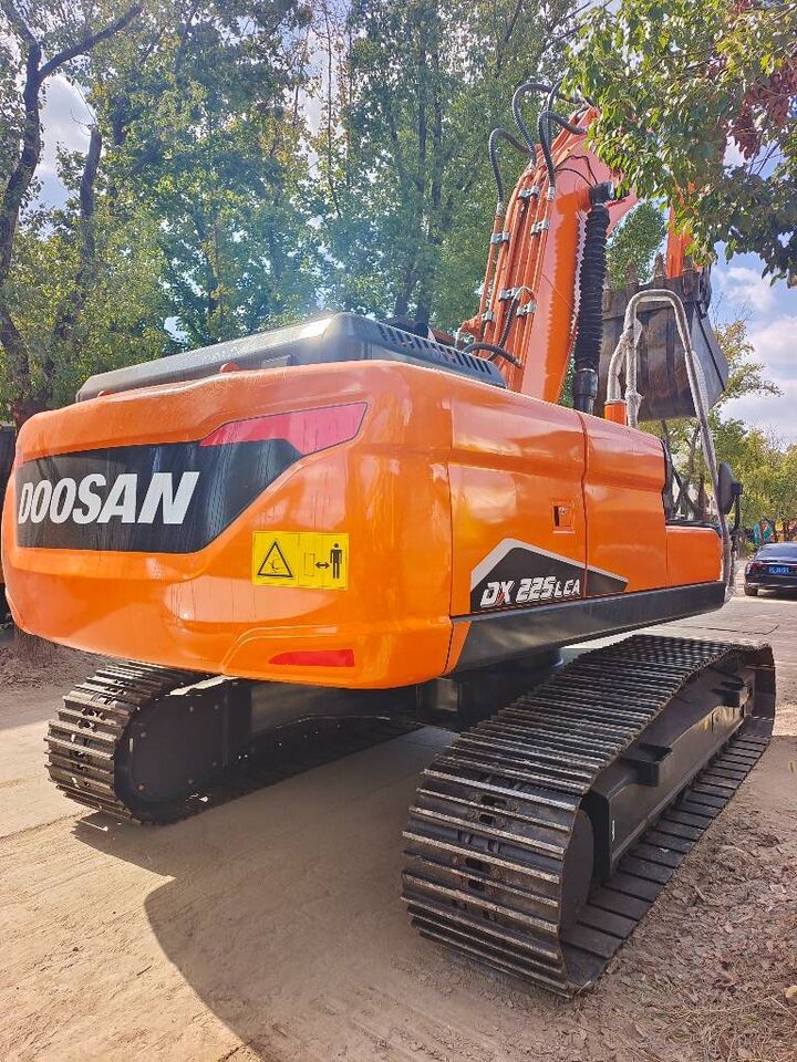2024 Doosan DX225LCA crawler excavator rear three-quarter view 2024 Doosan DX225LCA crawler excavator rear three-quarter view