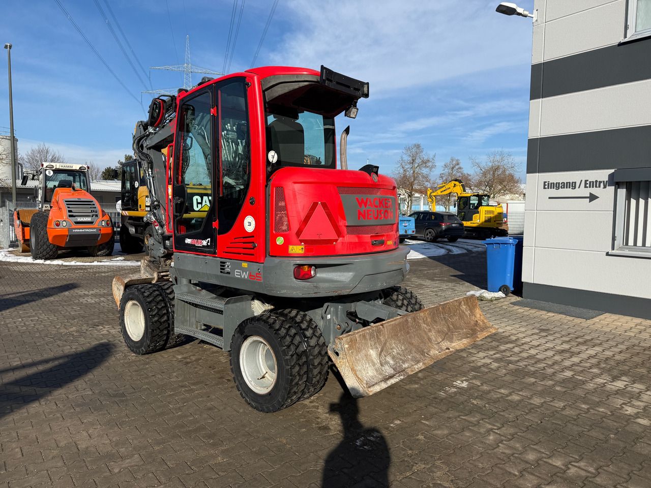 2019 Wacker Neuson EW65 wheel excavator rear three-quarter view 2019 Wacker Neuson EW65 wheel excavator rear three-quarter view