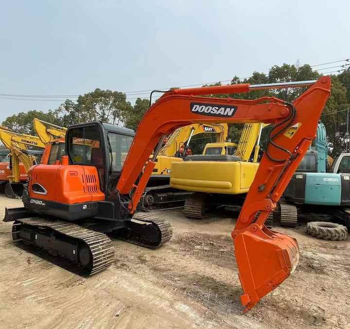 2020 Doosan DX60 crawler excavator, side view 2020 Doosan DX60 crawler excavator, side view