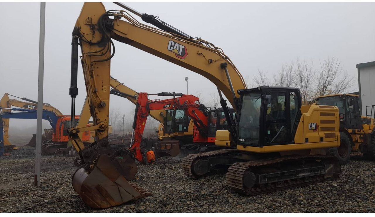 2021 Caterpillar 320-07 crawler excavator, front three-quarter view