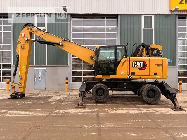 2020 Caterpillar MH3024-06C material handler, side view