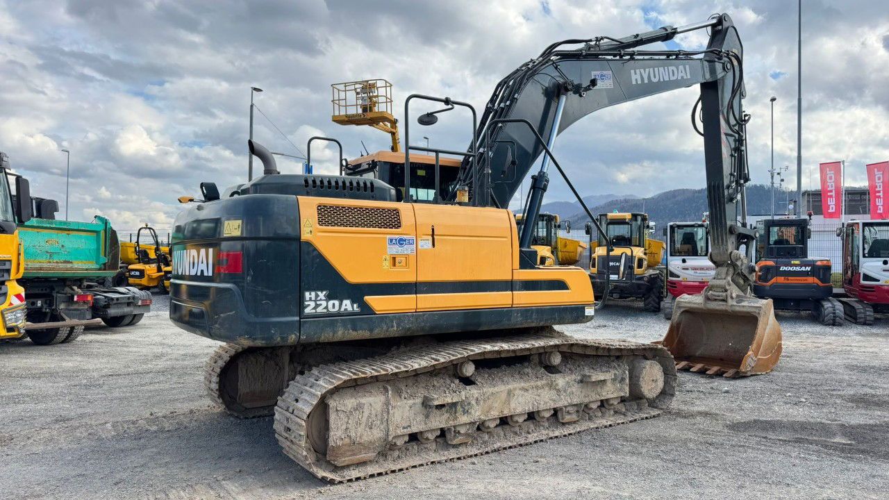 2023 Hyundai HX220AL crawler excavator, rear three-quarter view 2023 Hyundai HX220AL crawler excavator, rear three-quarter view