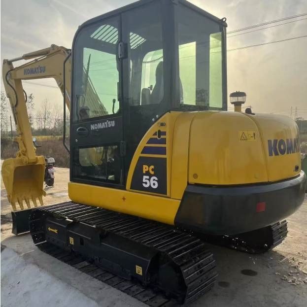 2024 Komatsu PC56-7 mini excavator, rear three-quarter view 2024 Komatsu PC56-7 mini excavator, rear three-quarter view
