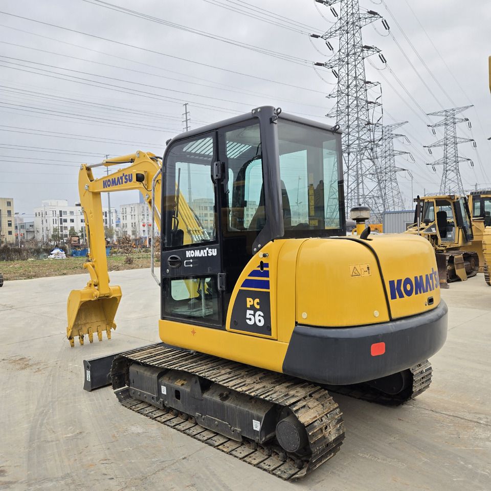 2022 Komatsu PC56 mini excavator, rear three-quarter view 2022 Komatsu PC56 mini excavator, rear three-quarter view