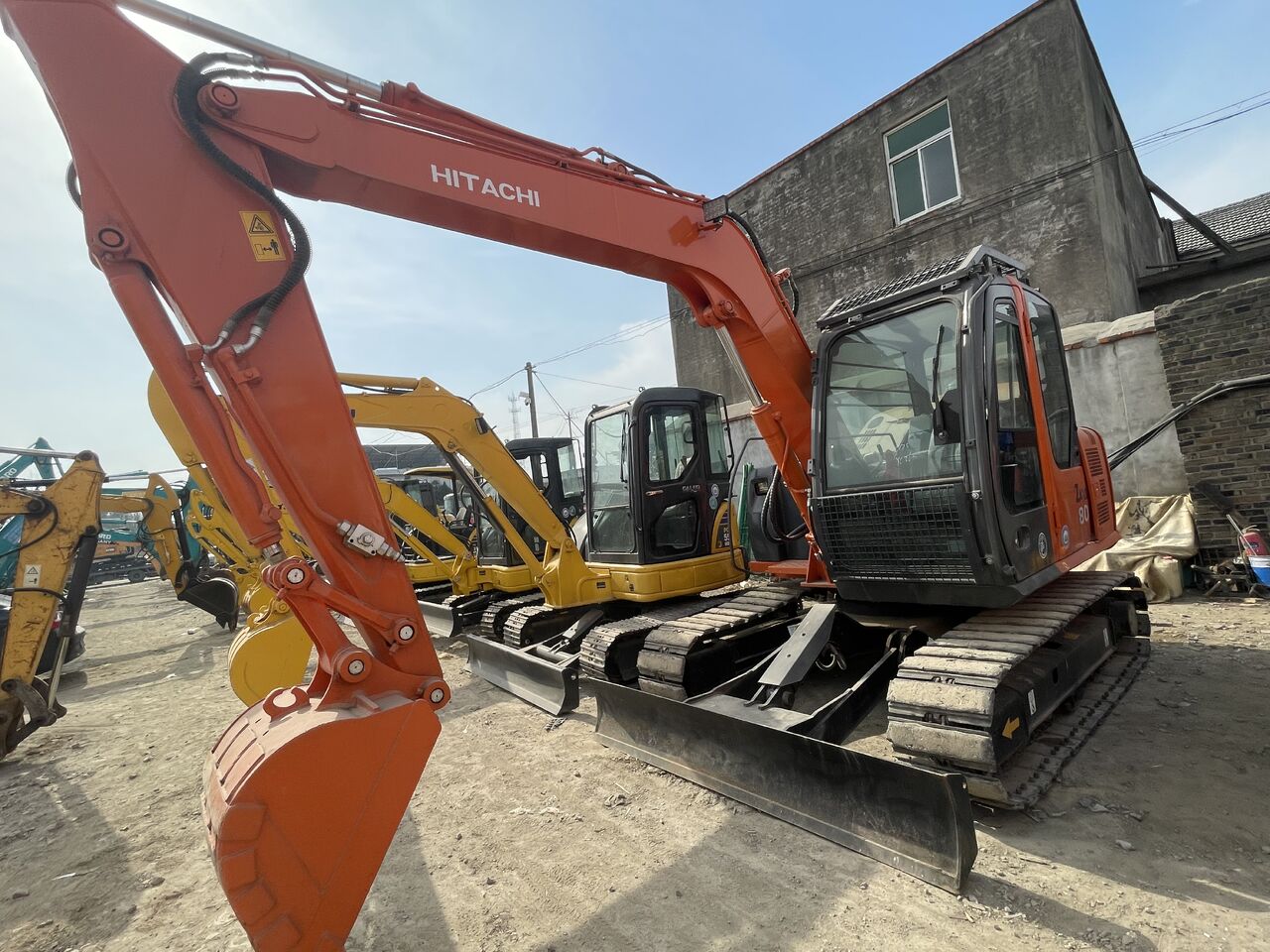 2023 Hitachi ZX80 crawler excavator, front three-quarter view