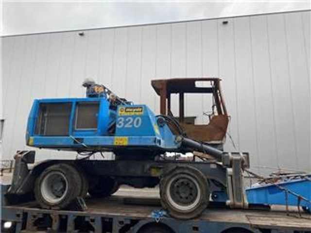 2013 Fuchs MHL320 material handler, side view