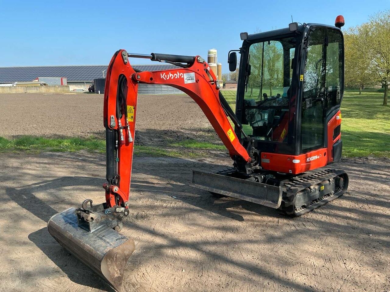 2024 Kubota KX019-4 mini excavator, side view