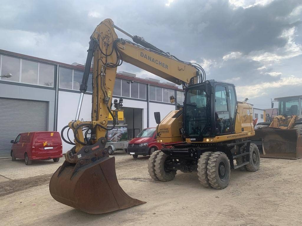2022 Caterpillar M319-07B wheel excavator, front three-quarter view 2022 Caterpillar M319-07B wheel excavator, front three-quarter view