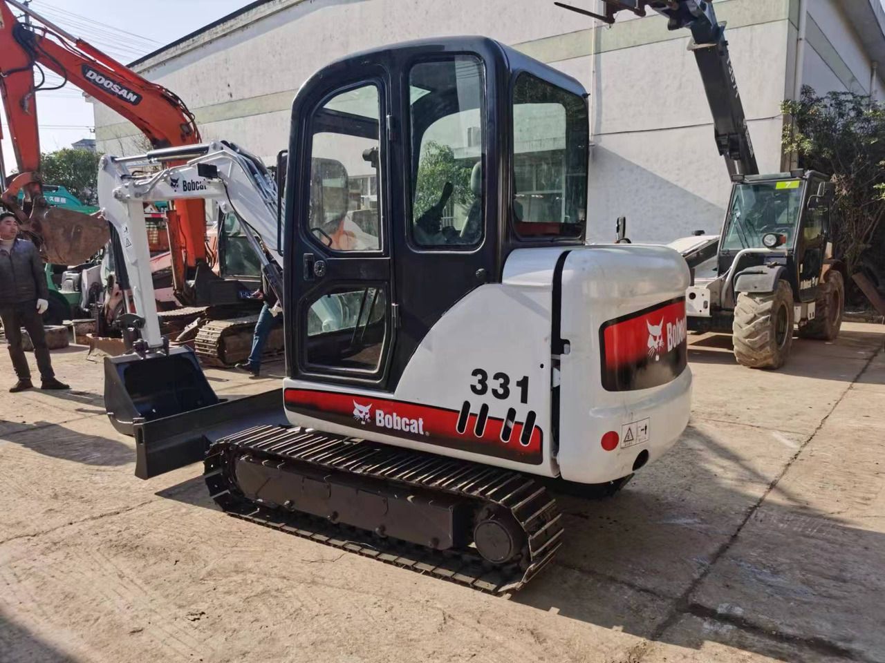 2012 Bobcat 331G mini excavator, rear three-quarter view 2012 Bobcat 331G mini excavator, rear three-quarter view