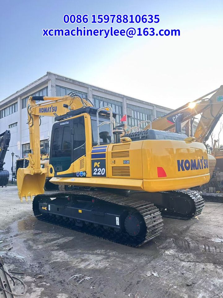 2023 Komatsu PC220 crawler excavator, rear three-quarter view 2023 Komatsu PC220 crawler excavator, rear three-quarter view