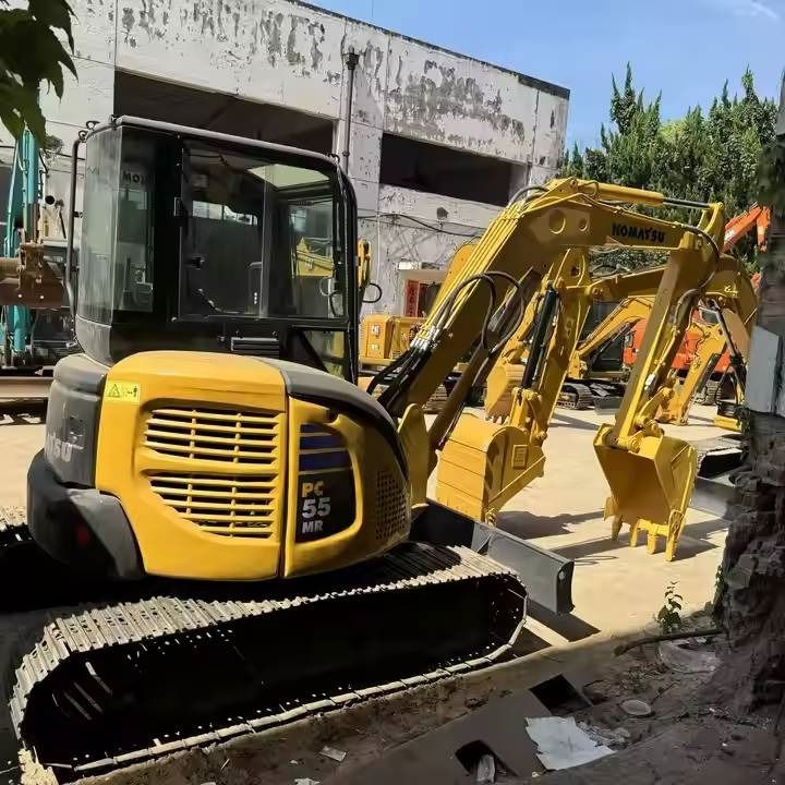 2023 Komatsu PC-55MR mini excavator, rear three-quarter view