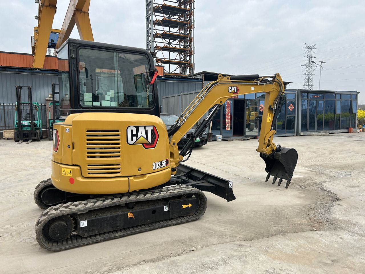 2024 Caterpillar 303.5E mini excavator, side view