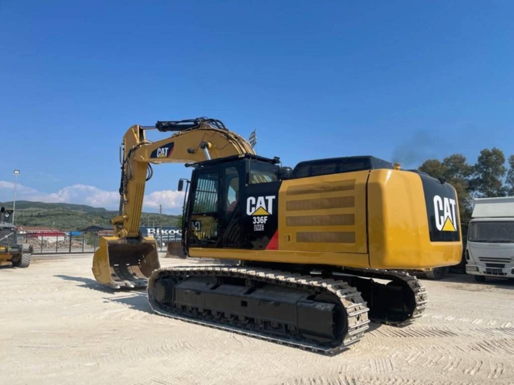 2017 Caterpillar 336F L crawler excavator, rear three-quarter view 2017 Caterpillar 336F L crawler excavator, rear three-quarter view