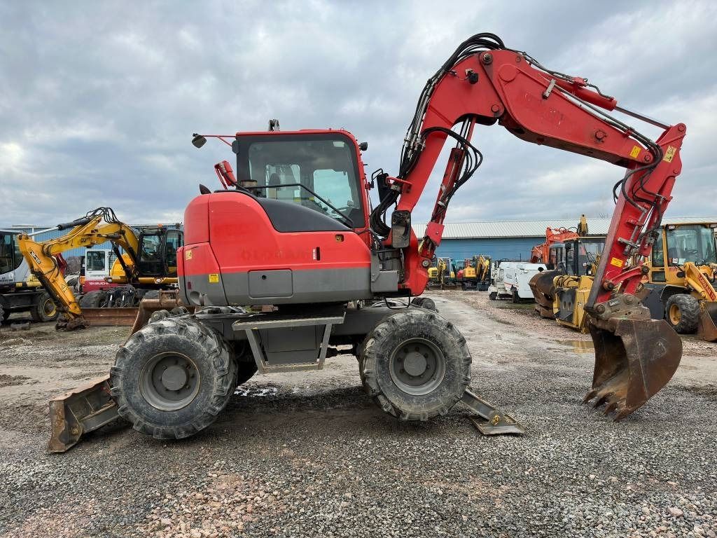 2011 Komatsu PW98MR-8 wheel excavator, side profile view