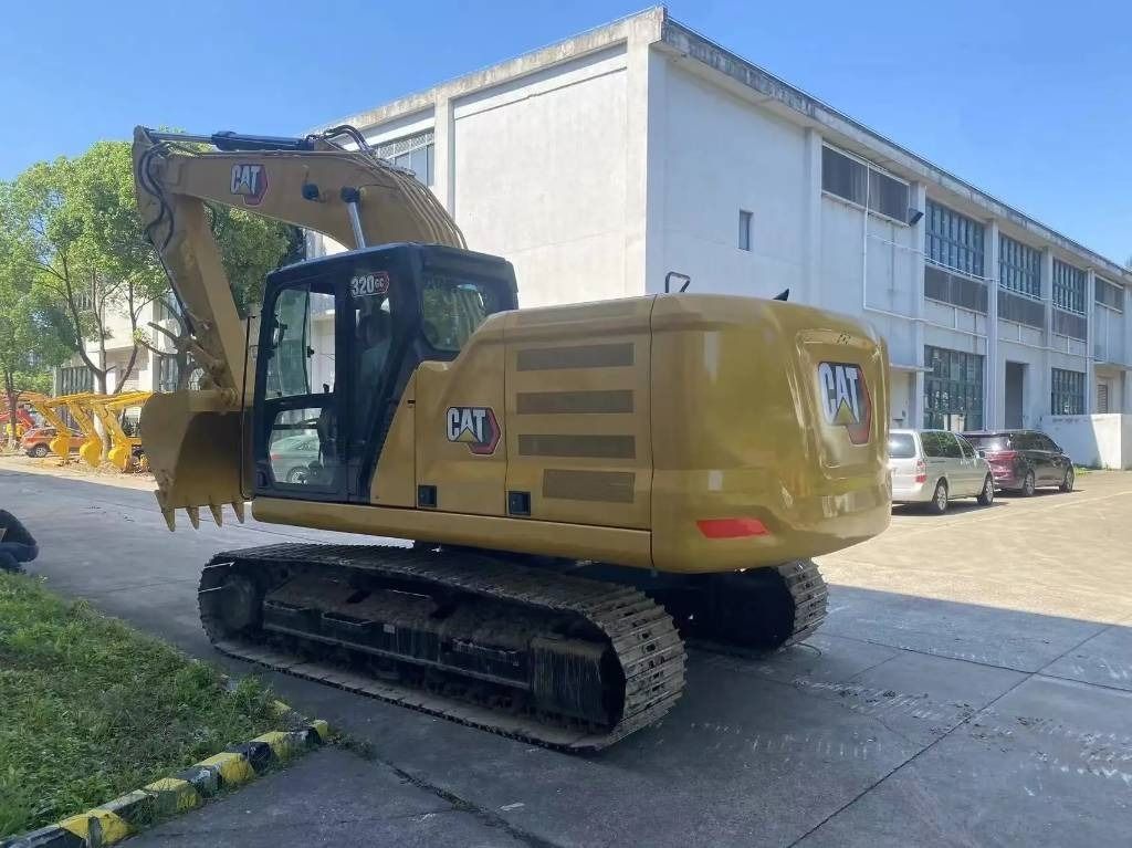 2018 Caterpillar 320GC excavator, rear three-quarter view 2018 Caterpillar 320GC excavator, rear three-quarter view