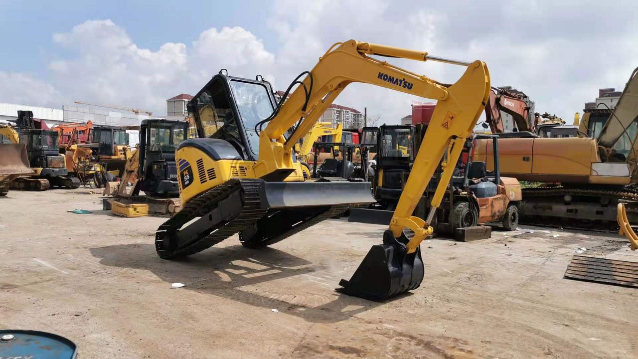 2020 Komatsu 55MR mini excavator, front three-quarter view 2020 Komatsu 55MR mini excavator, front three-quarter view
