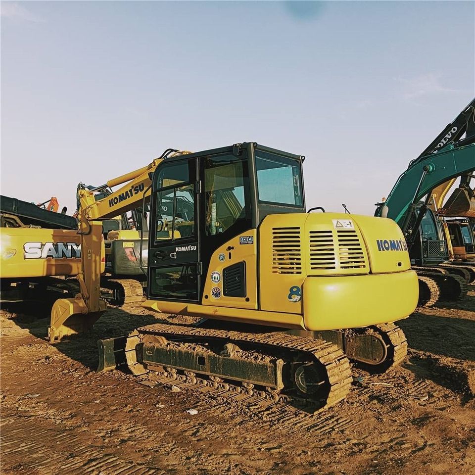 2024 Komatsu PC70-8 mini excavator, rear three-quarter view 2024 Komatsu PC70-8 mini excavator, rear three-quarter view