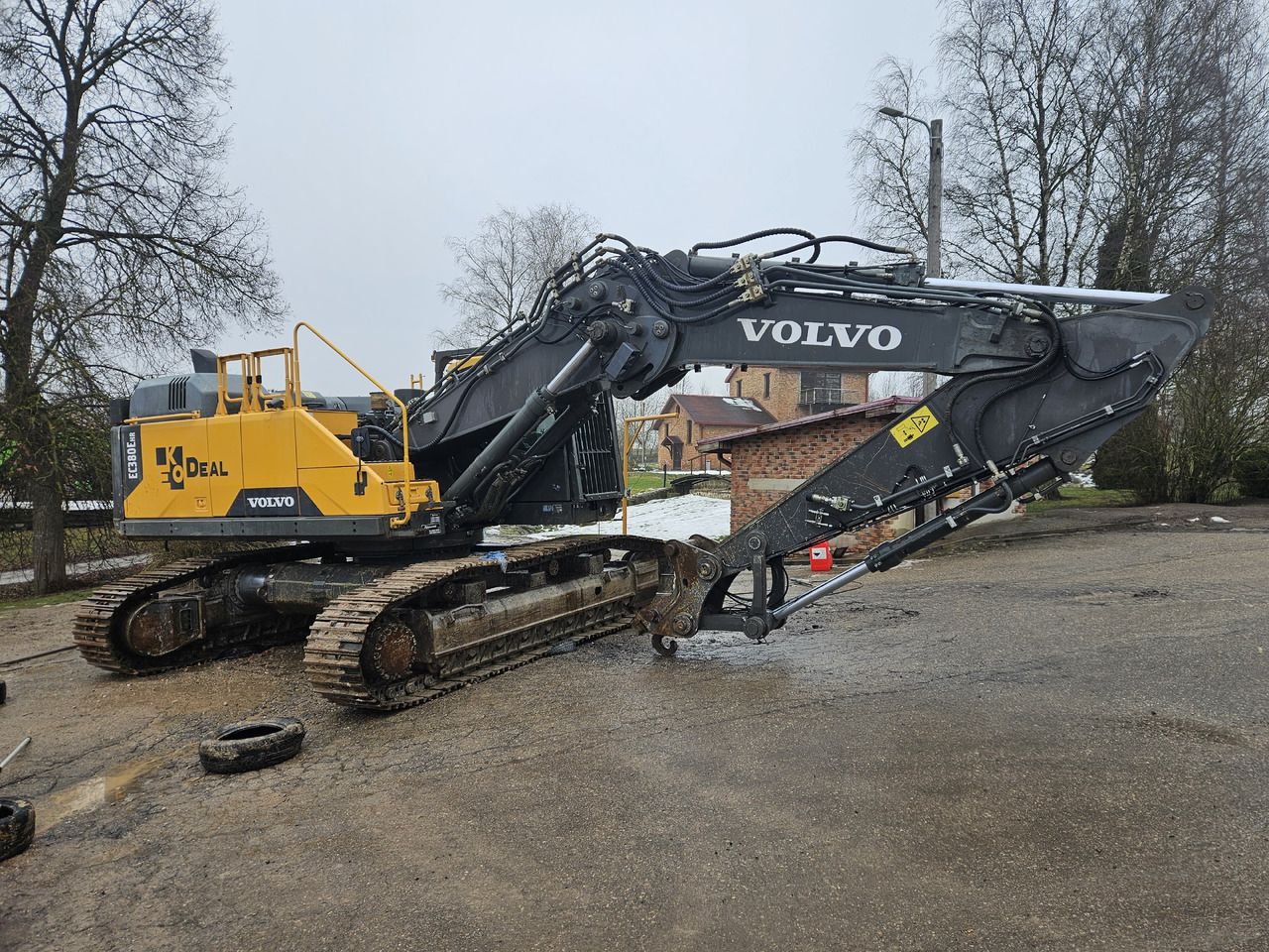 2016 Volvo EC380EHR demolition excavator, side view